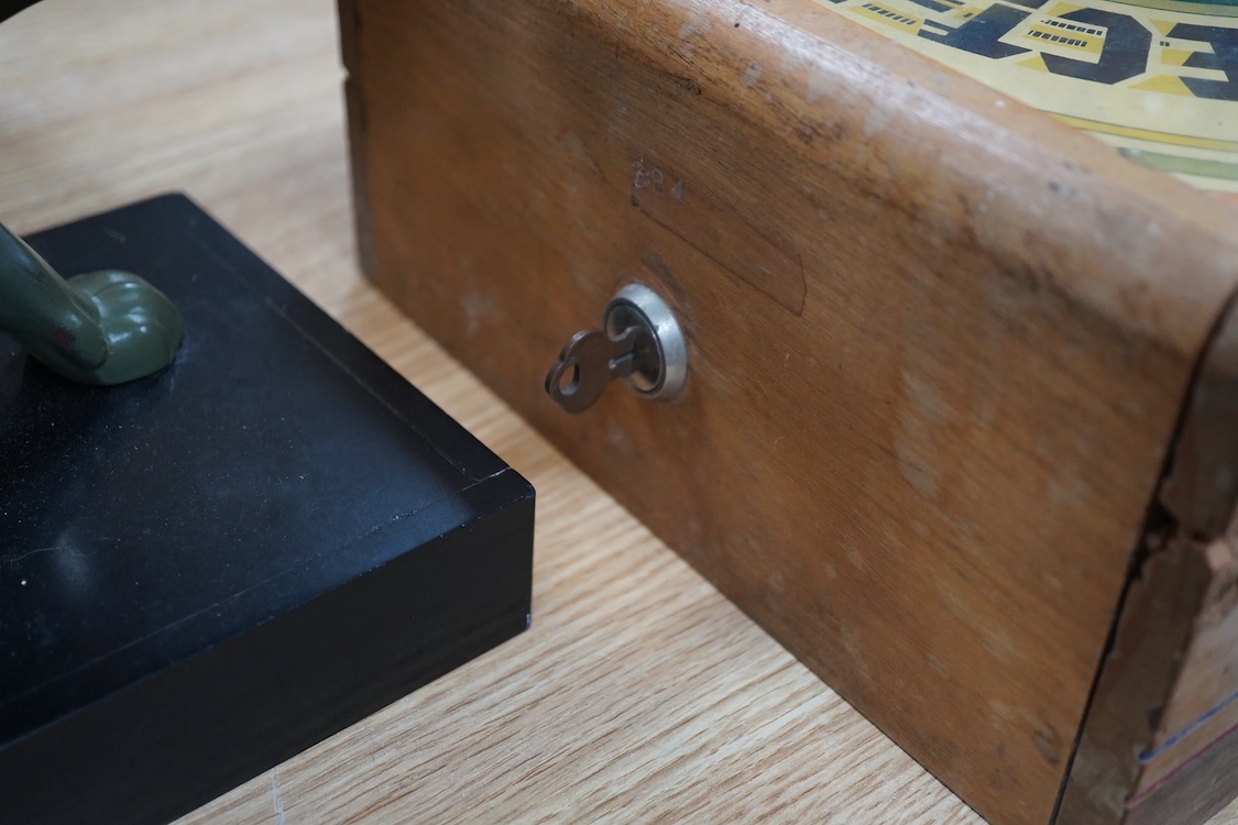 A ‘Select-Em’ table top pinball style dice game in a teak frame dated 1933, with Board of Equalization sales tax permit label for the State of California, 26cm wide, 35.5cm deep, 12.5cm high